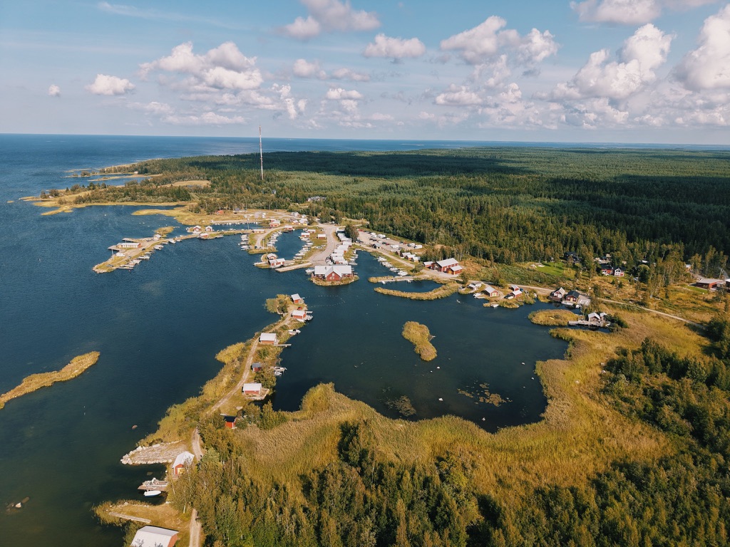 Aerial view of a small harbor on the coast.